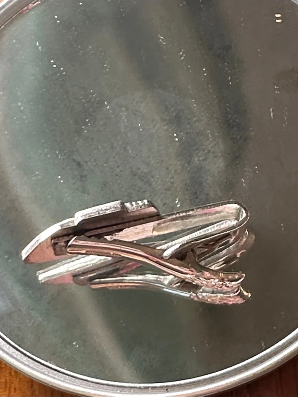 Vintage 60s Silver Tone Teletype tie clip manufactured by the Robbins Co.